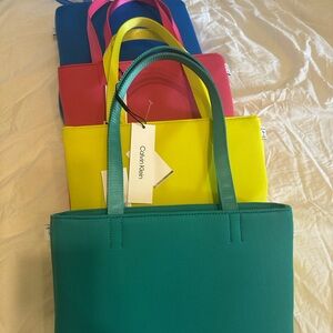 Calvin Klein Vibrant Tote Bag Collection